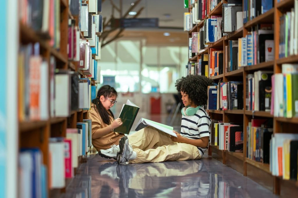 Author reading in a library